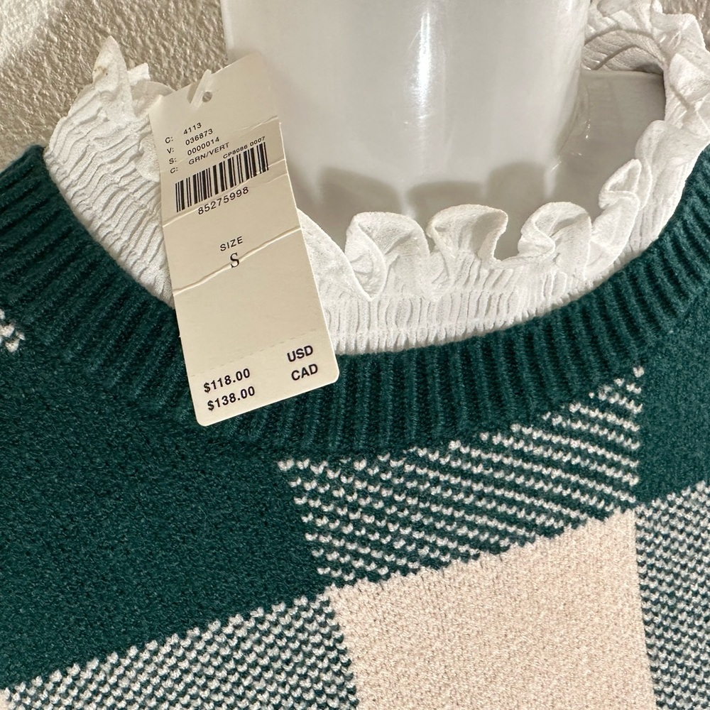 Anthropologie sweater in a classic green plaid. Size S